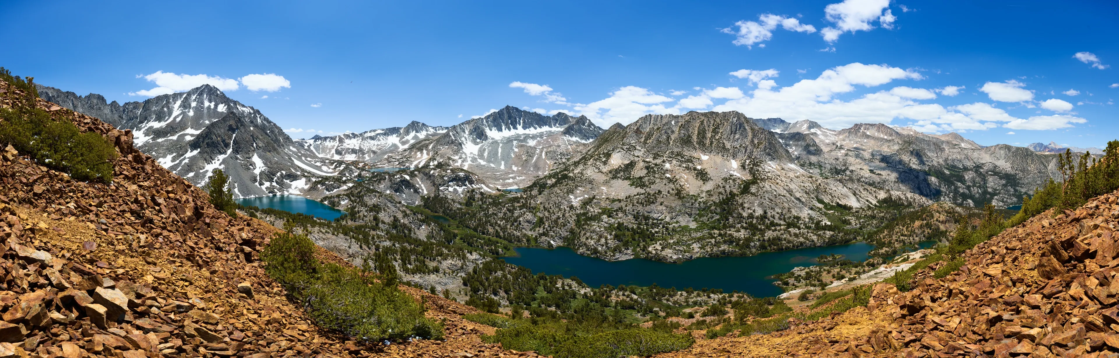 A view of A High Sierra Dessert: Chocolate Peak and Lakes featuring Bishop Pass in Inyo National Forest, CA on the Chocolate Lakes Loop Trail at midday in Summer.