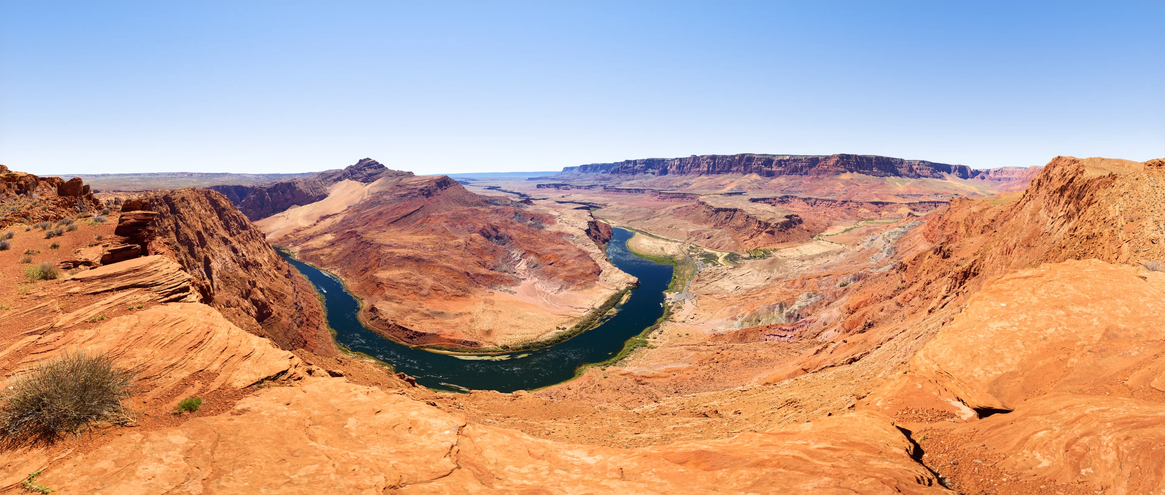 A view of Cobalt and Sandstone: Lees Ferry from Spencer Lookout featuring Colorado River in Glen Canyon National Recreation Area, AZ on the Spencer Trail during the afternoon in Autumn.